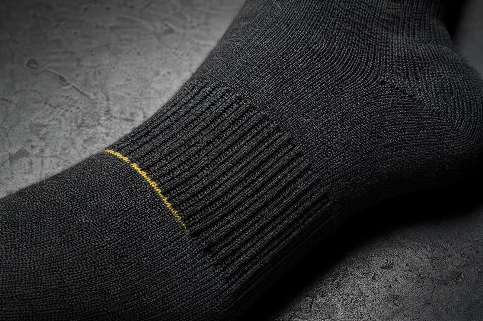 Cut section showing the 3 mm terry loop height under the sole